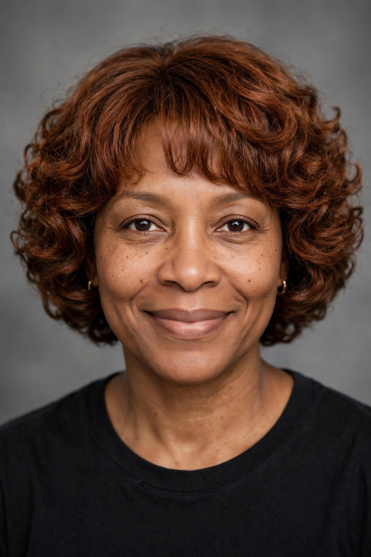 Curly bob with bangs in auburn